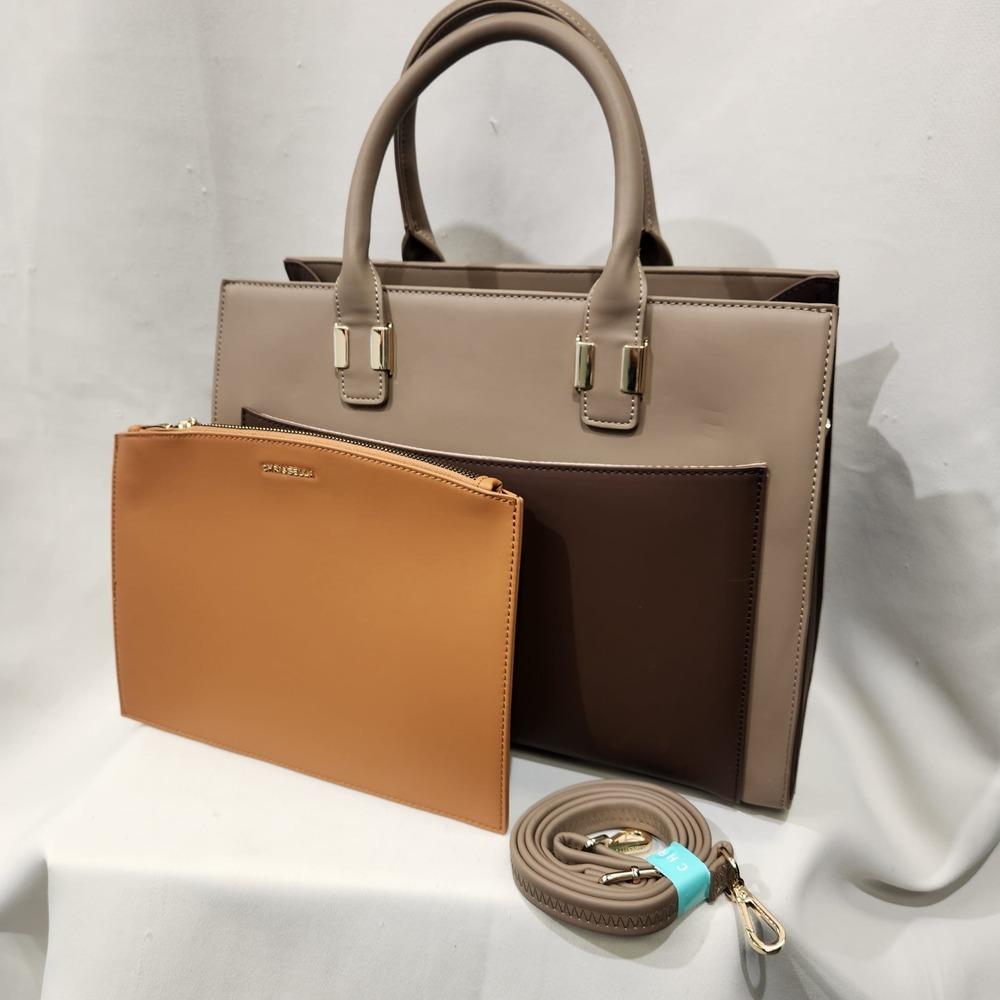 Another view of Mud color handbag with camel colored slip in pouch