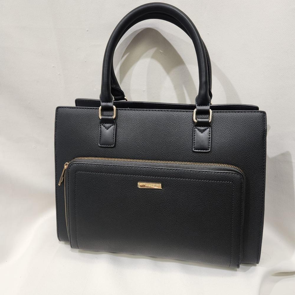 Front zip pocket of black Chris Bella handbag