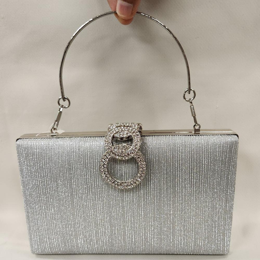 Silver handle provided with Elegant silver party purse