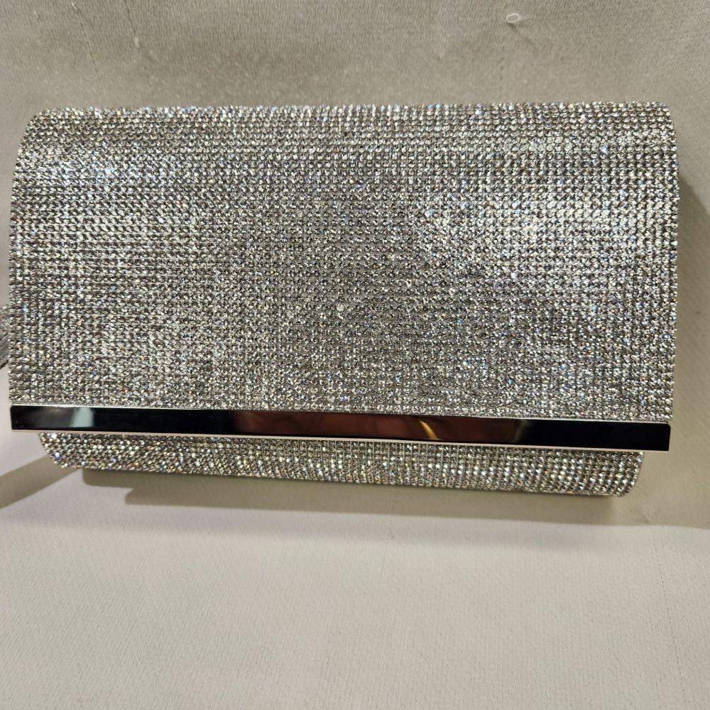 Another view of stone studded silver frame party purse