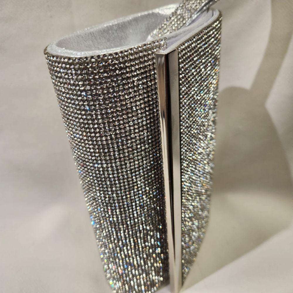 Front of stone studded silver party purse