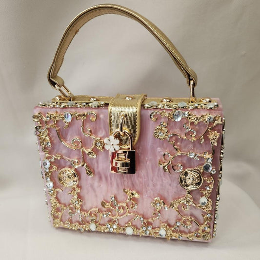 Elegant pink party purse with gold embellishment