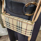 Top view of Beige side bag with plaid pattern and adjustable shoulder strap