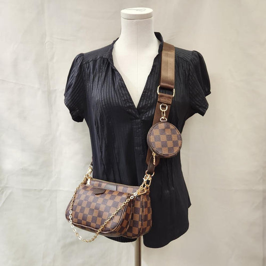 Full view of Three piece side bag set in brown checkered print