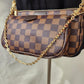 Detailed view of two rectangular checkered print bags