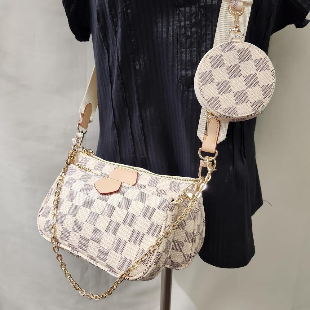 Detailed view of three piece side bag set in black & white print