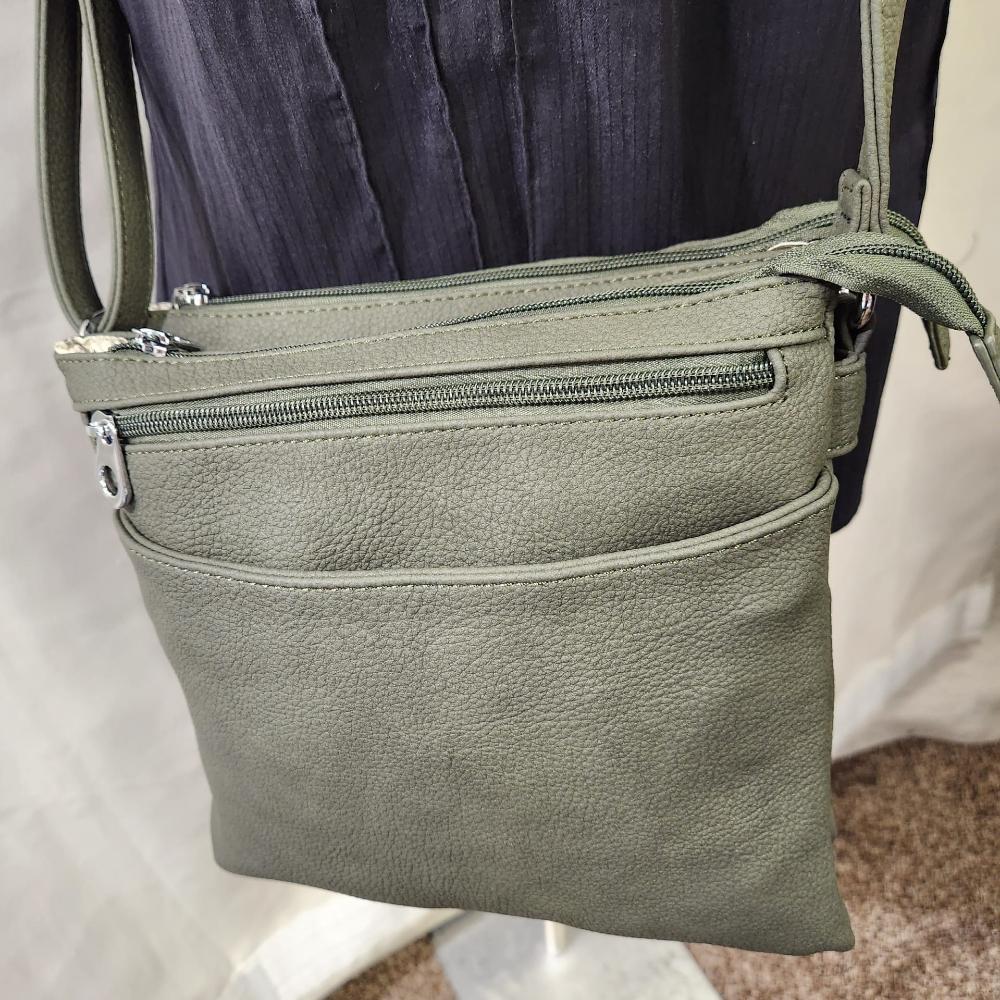 Detailed front view of Artificial leather side bag in army green