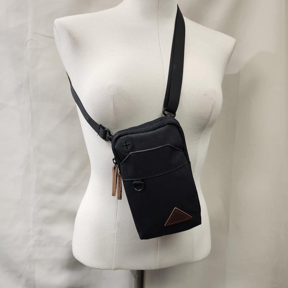 Another view of Black side bag with a belt loop