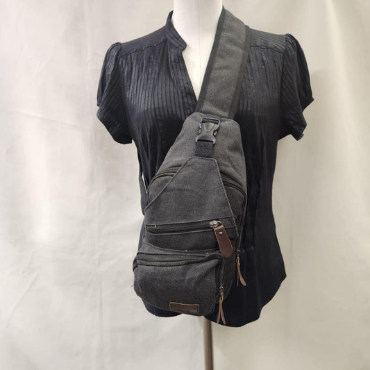 Greyish black side bag with multiple pockets