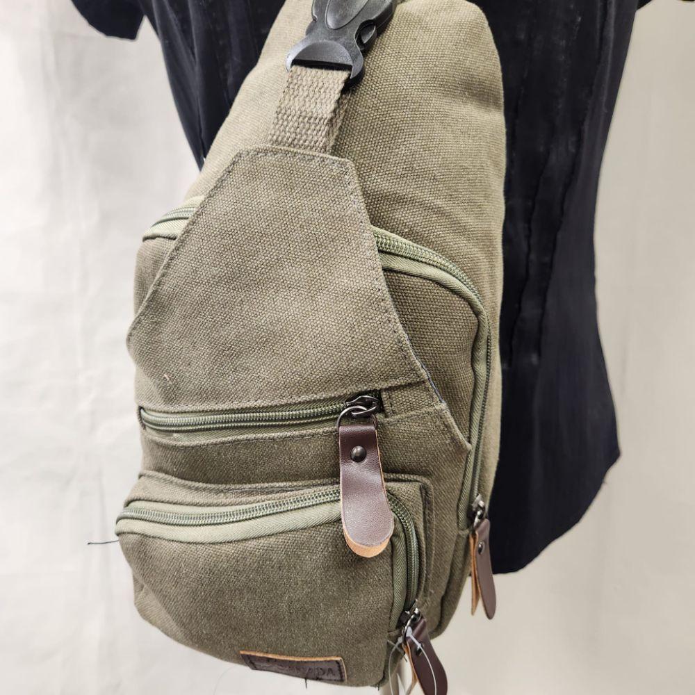 Detailed front view of Army green side bag