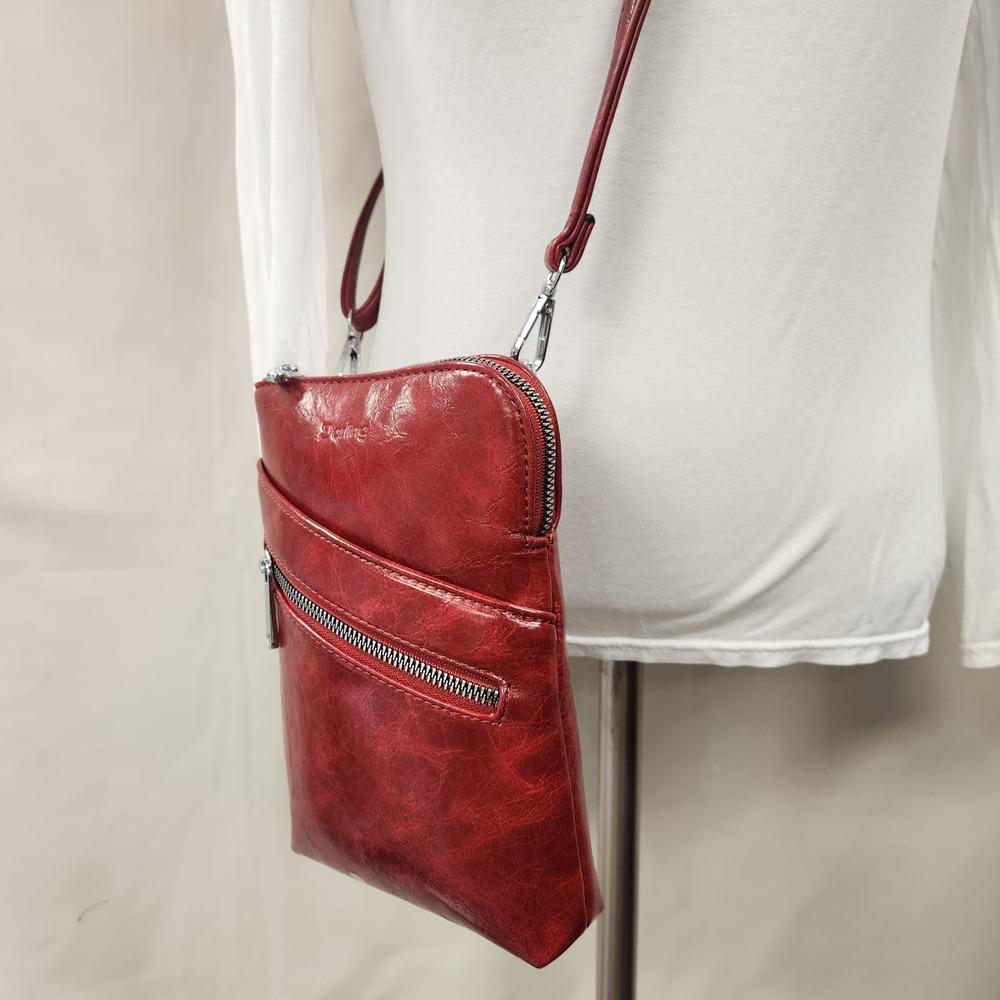 Detailed front view of Small red colored side bag