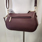 Rear view of Dark burgundy side bag 