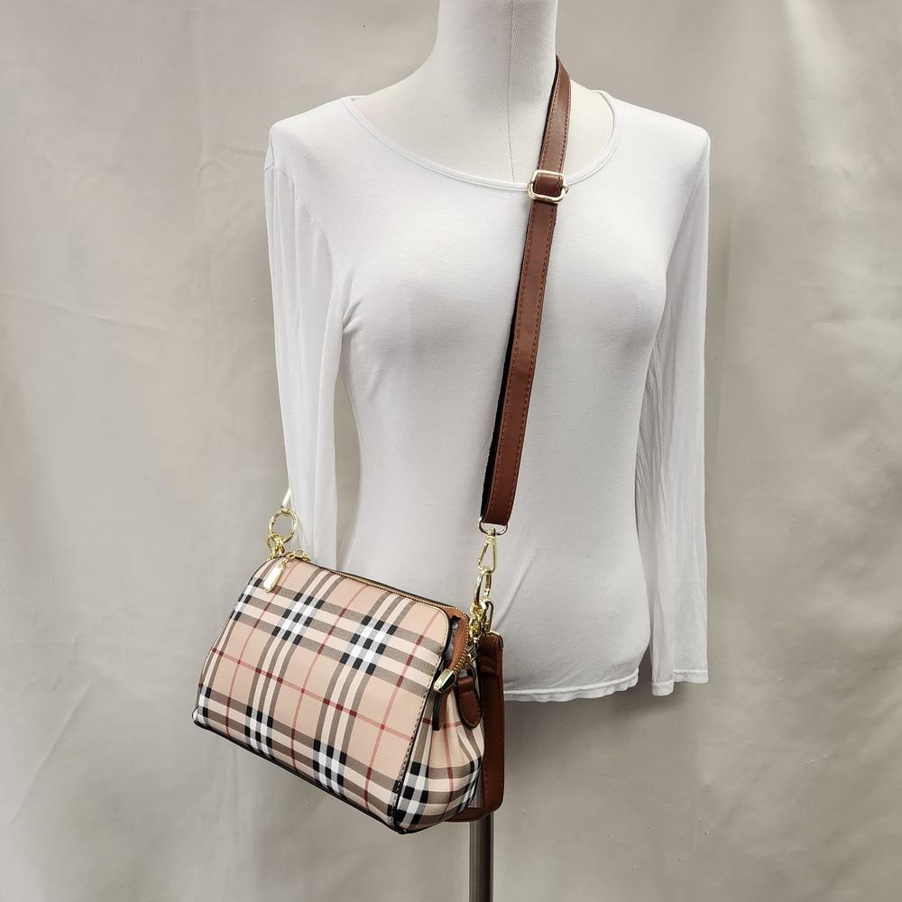 Full view of Plaid pattern side bag with brown straps