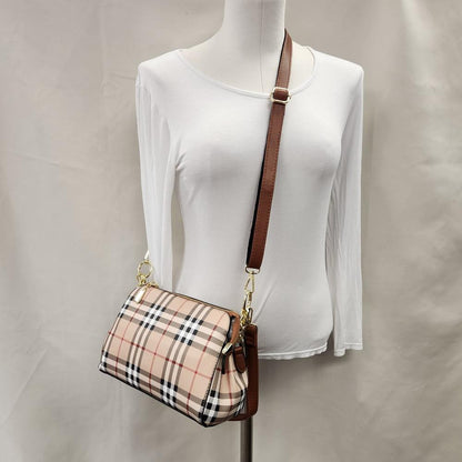 Full view of Plaid pattern side bag with brown straps