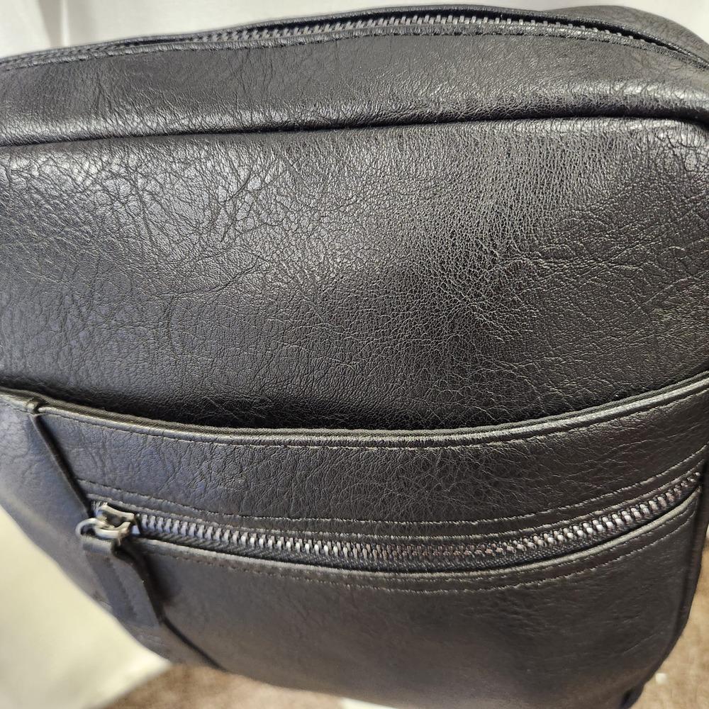 Black color multiple pocket side bag