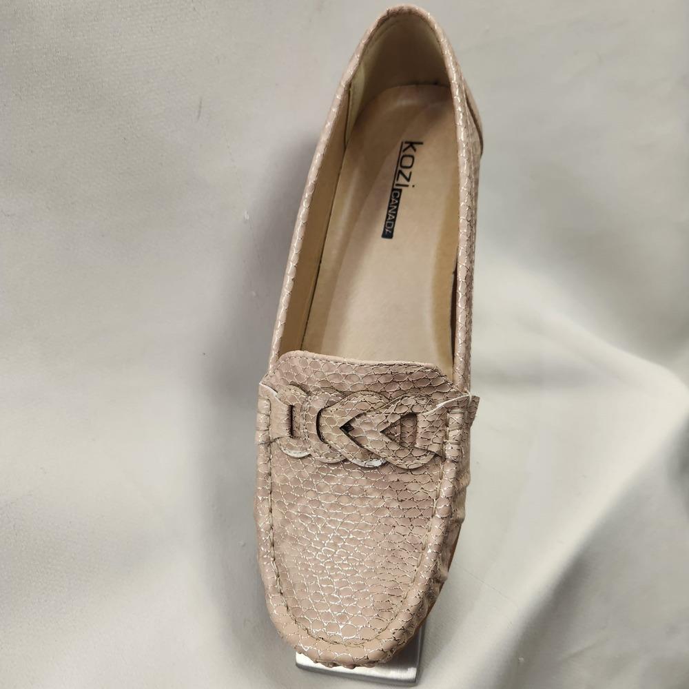 Front view of Champagne color textured flat shoes for women