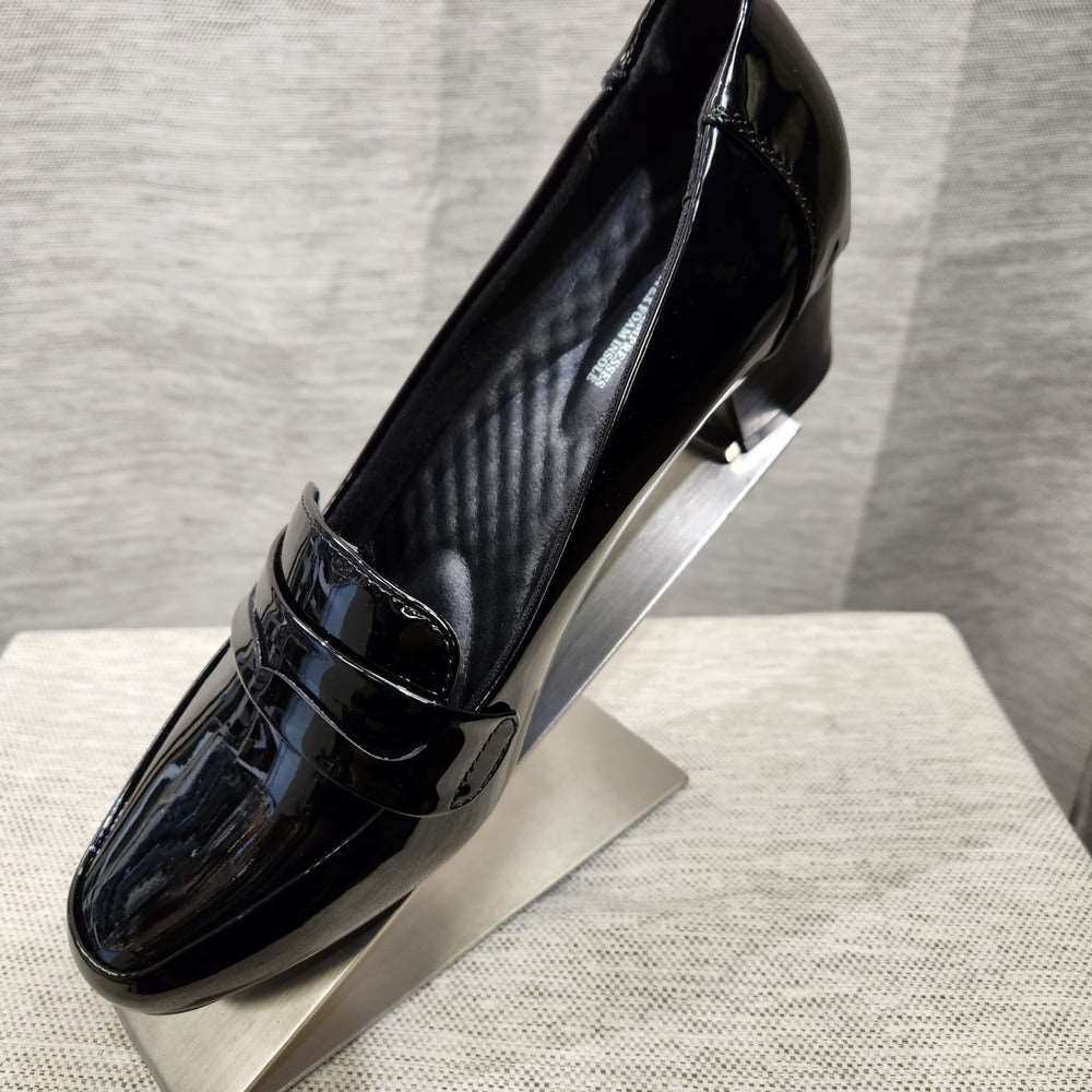 Another view of black patent pumps with small broad heels