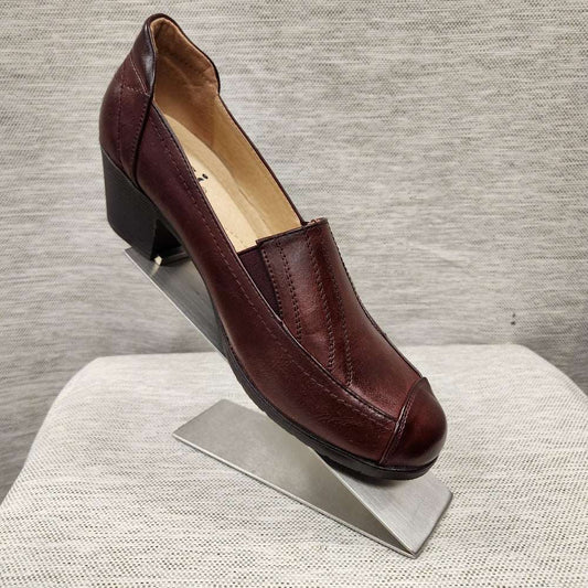 Another side view of Burgundy shade pumps with padded sole