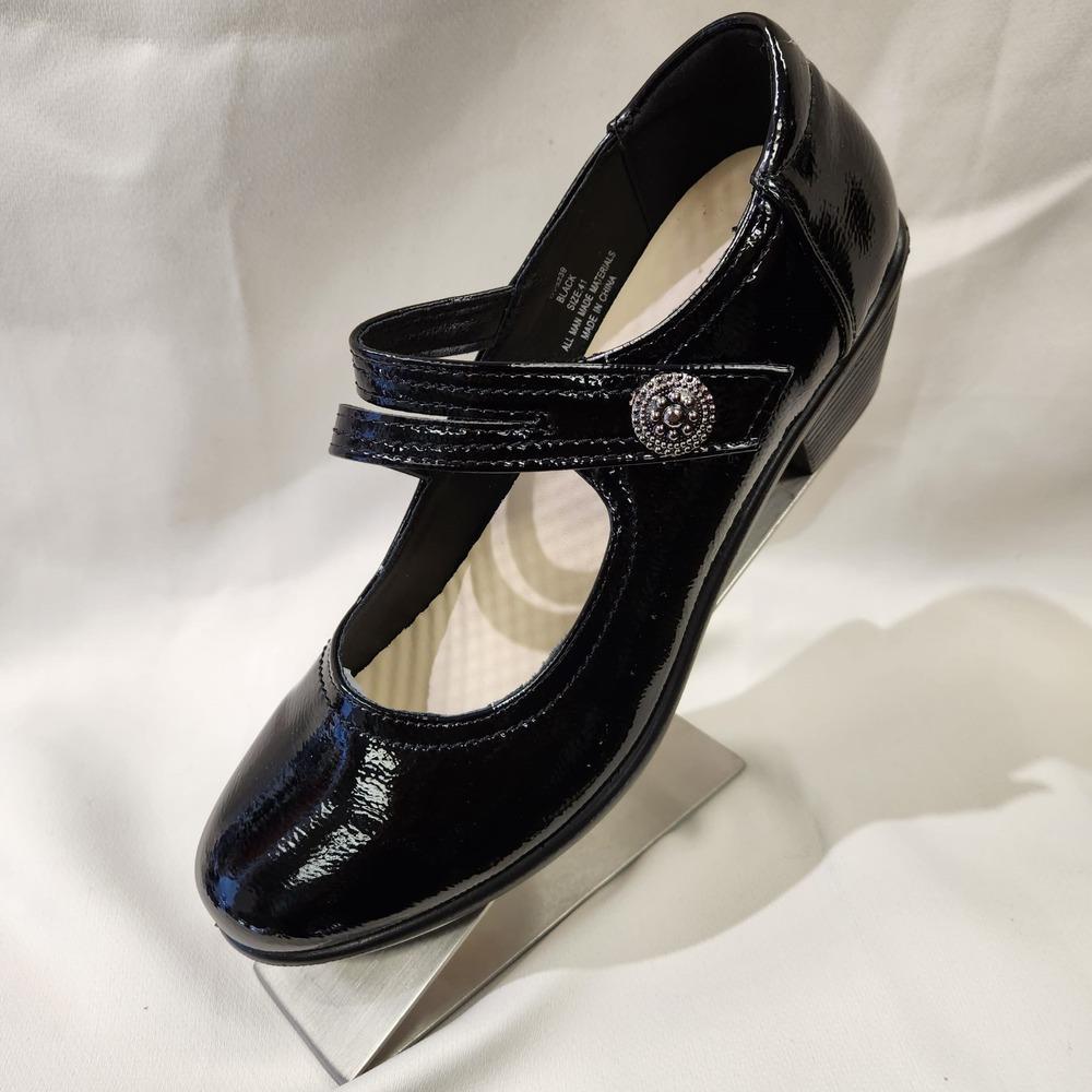 Another side view of black broad heel patent pumps
