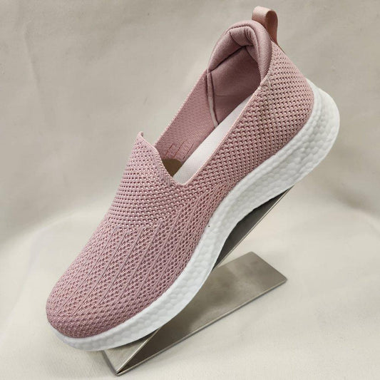 Side view of Dusty pink light weight slip on runners