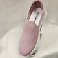 Front view of Dusty pink light weight slip on runners