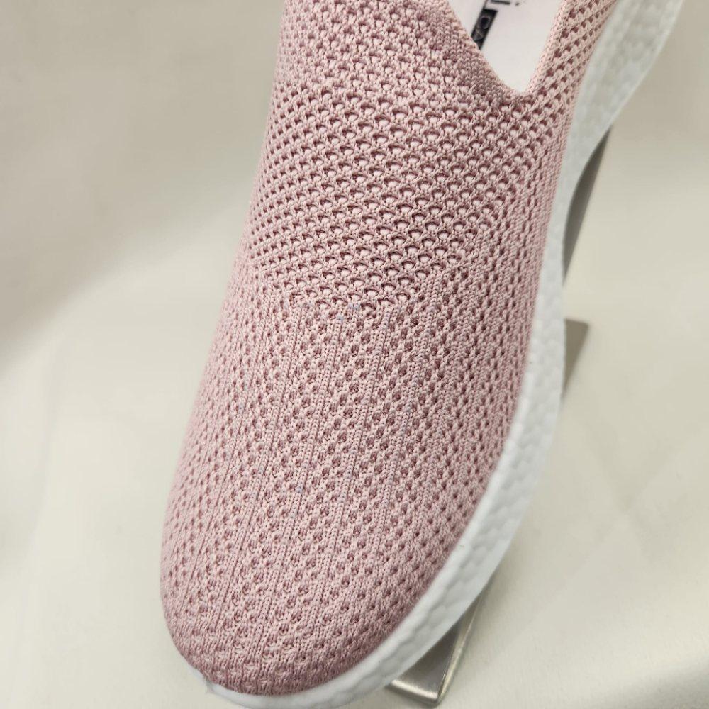 Detailed view of Dusty pink light weight slip on runners