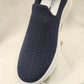 Detailed view of Navy blue light weight slip on runners