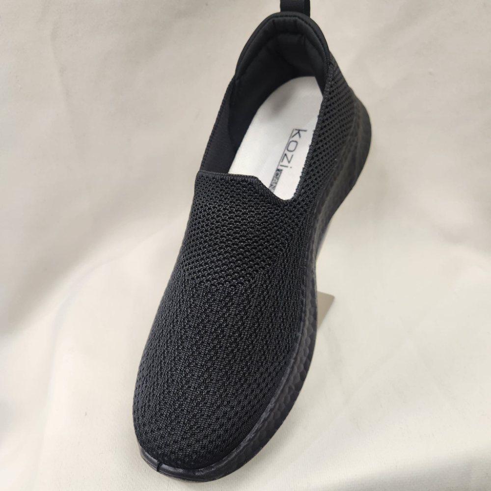 Front view of Black light weight slip on runners for women