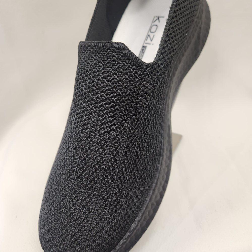 Detailed view of Black light weight slip on runners for women