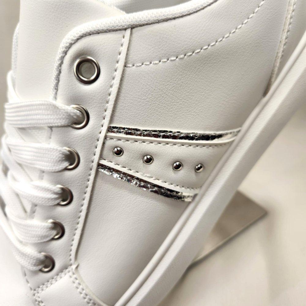 Detailed side view of Silver accent white runners with lace closure