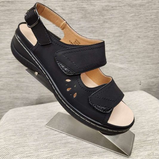 Side view of black orthopedic summer sandal with velcro closure