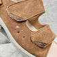 Detailed view of the front of camel color summer sandal