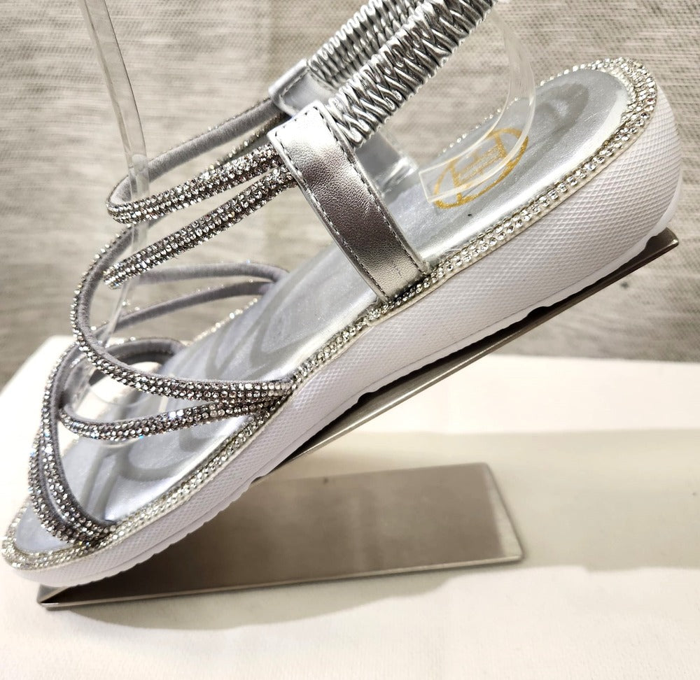 White wedge heel of silver stone studded sandal