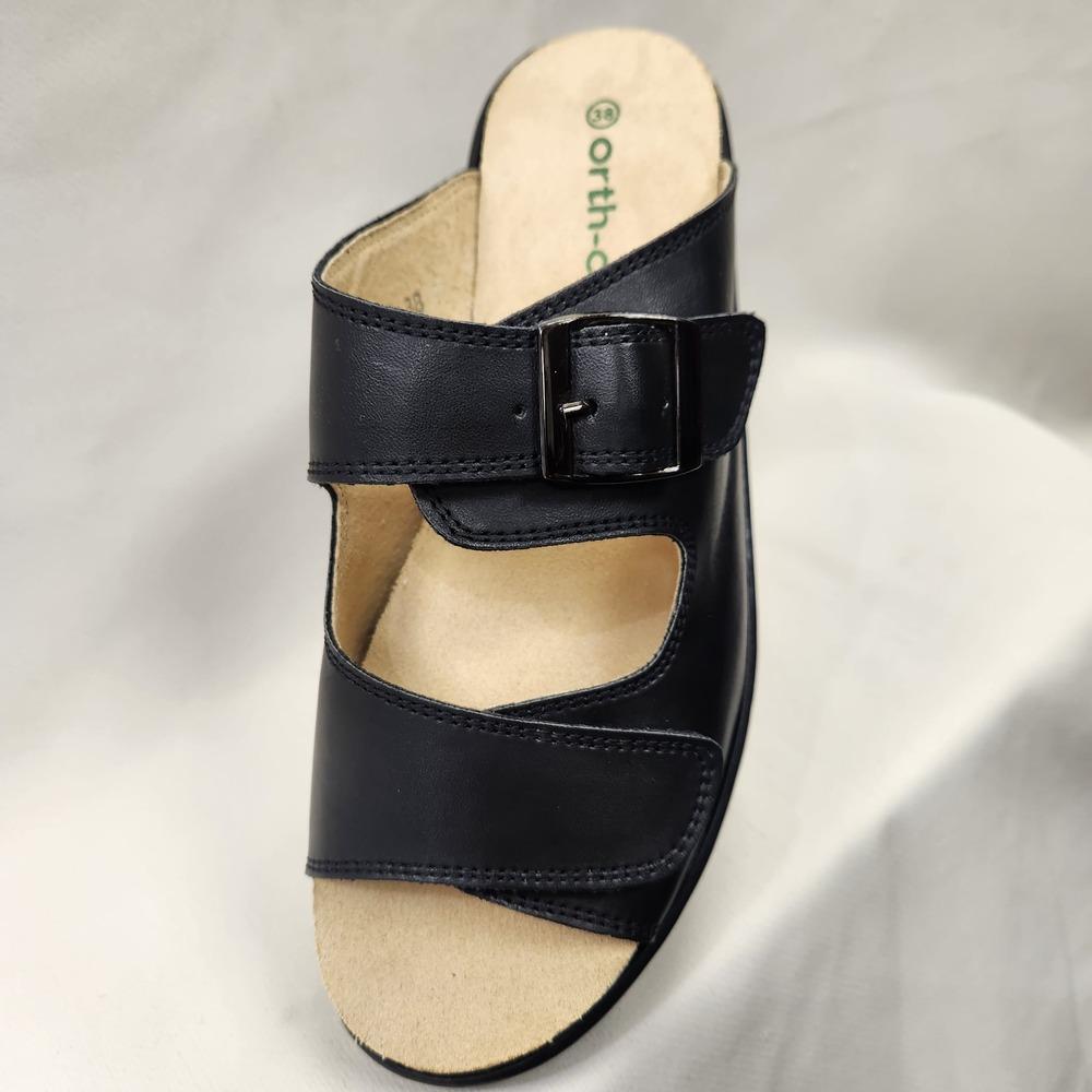 Front view of Black slip on summer sandal with velcro closure