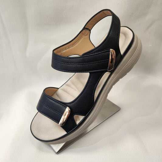 Black summer sandal with velcro closure and back strap