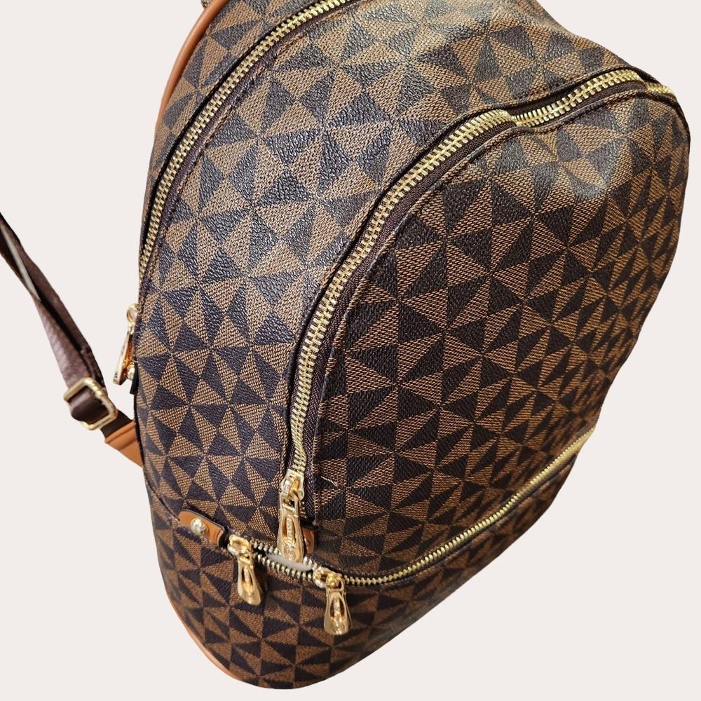 Compartments and gold zipper detail of geometric print brown backpack