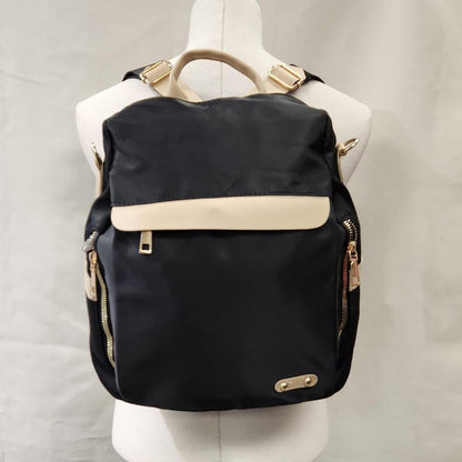 Multiple compartment black backpack with beige trim