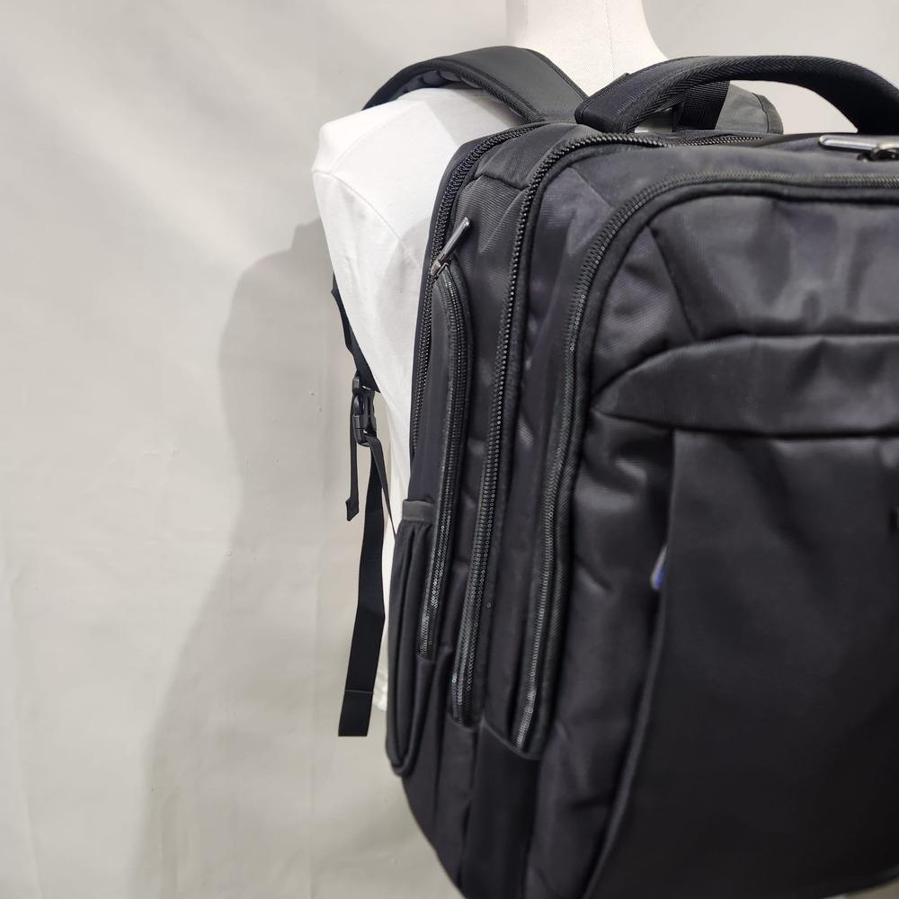 Side view of black backpack