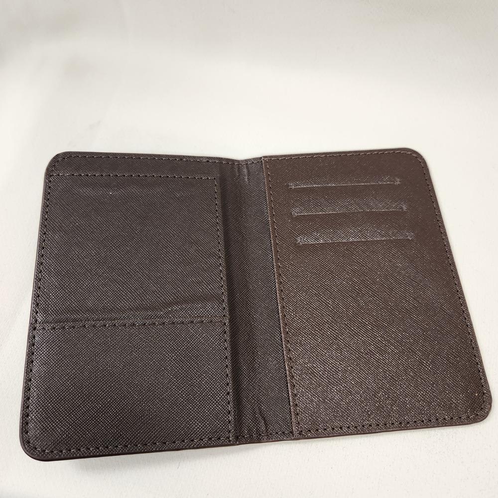 Passport cover in brown and tan club print when opened