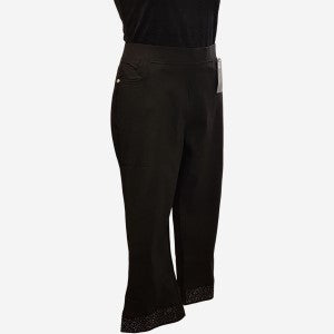 Capri pants in black with stone detailing at hem.