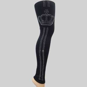 Black colored leggings with stones and crown shaped pattern on the outer side