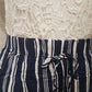 Waistband of blue and white striped culottes