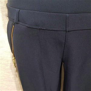 Zipper detail on the front of warm leggings in blue