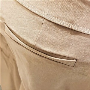 Back pocket details of beige color jeggings