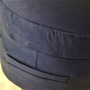 Back pocket detail of blue color jeggings