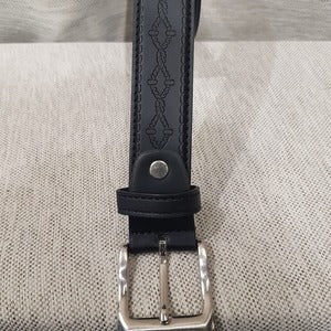 Detailed view of Split leather belt for men with diamond shaped pattern