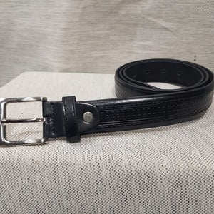 Full view of Split leather belt for men with geometric pattern