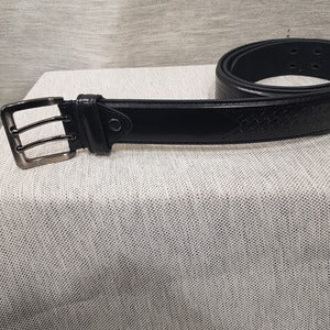 View of Split leather belt for men with basket weave pattern