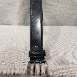 Detailed view of the buckle on Split leather belt for men 