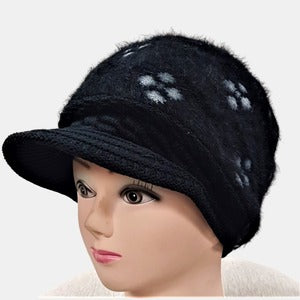Winter peaked cap in black and grey patterned crown